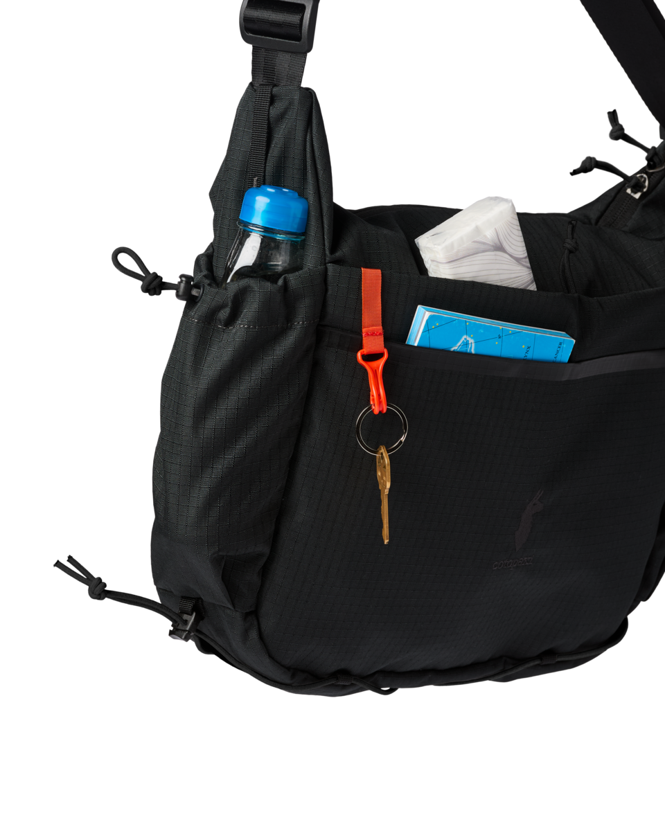f26-u-viaje-12l-shoulder-bag-cotopaxi-black-a1-c-r.png